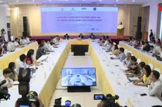 Bộ trưởng, Chủ nhiệm Văn phòng Chính phủ Mai Tiến Dũng và Giám đốc Quốc gia Ngân hàng Thế giới tại Việt Nam Ousmane Dione đồng chủ trì Hội nghị. Ảnh: VGP