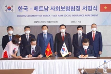 Lễ ký Hiệp định về bảo hiểm xã hội giữa Chính phủ Việt Nam và Chính phủ Hàn Quốc sáng ngày 14/12/2021 - ảnh Thành Chung