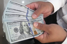 Lo ngại FED tăng lãi suất USD là nguyên nhân bán ròng của khối ngoại. Ảnh: Minh Duy