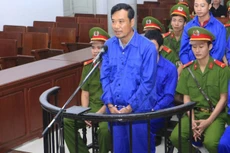 Bị cáo Trần Quốc Đông, nguyên Phó Tổng giám đốc Tổng công ty Đường sắt Việt Nam, nguyên Giám đốc RPMU tại phiên tòa xét xử sơ thẩm tháng 10/2015. Ảnh: Doãn Tấn