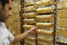 Giá vàng sụt giảm vì đồng USD mạnh