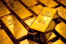 Vàng giảm giá mạnh khi Clinton đang dẫn điểm