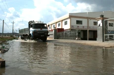 Thiên tai ảnh hưởng đến hầu hết hoạt động kinh doanh của doanh nghiệp. Ảnh: Phương Hà