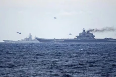 Tàu sân bay Nga Kuznetsov và tàu tuần dương Peter Đại đế trong bức ảnh chụp tuần trước. Ảnh: Hải quân Na Uy