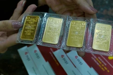 Thị trường vàng miếng trong nước chủ yếu có sự tham gia của nhà đầu tư nhỏ lẻ. Ảnh: Q.Đ.