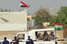 Lực lượng an ninh Iraq triển khai tại Kirkuk ngày 21/10 sau khi các tay súng IS tiến hành nhiều vụ tấn công liều chết tại thành phố này. (Nguồn: AFP/TTXVN)