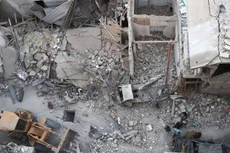 Quanh cảnh khu vực bị máy bay không người lái Mỹ không kích ở Syria. Ảnh: AFP.