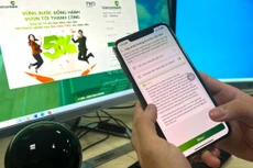 Đến hết ngày 22/7, có 22,5 triệu khách hàng thực hiện thành công xác thực sinh trắc học qua app và 3,8 triệu khách hàng thực hiện xác thực tại quầy. Ảnh: Nhã Chi