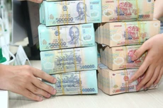 Tổng khối lượng trái phiếu chính phủ phát hành theo kế hoạch năm 2024 là 400.000 tỷ đồng. Ảnh: Nhã Chi
