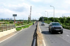 Dự án Đường dẫn kết nối cầu Phú Mỹ đã hoàn thành cách đây 11 năm nhưng gặp khó khăn trong quá trình thanh quyết toán. Ảnh: Châu Tuấn