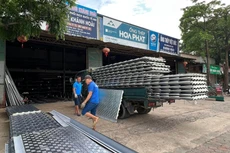 Dự thảo Nghị định về đăng ký doanh nghiệp đề xuất bỏ các quy định về đăng ký hộ kinh doanh. Ảnh: Nguyễn Huế