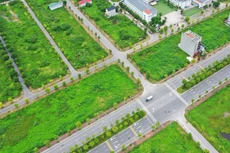 Luật Đất đai 2024 có hiệu lực từ 1/8/2024 quy định việc sử dụng giá trong bảng giá đất là giá khởi điểm để bán đấu giá đất đã hoàn thành đầu tư hạ tầng. Ảnh: Lê Tiên
