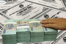 Các ngân hàng đang sở hữu 17,93 tỷ USD trái phiếu doanh nghiệp, tương đương 43% tổng giá trị toàn thị trường. Ảnh: Lê Tiên