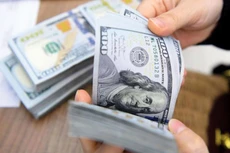 Việc Cục Dự trữ Liên bang Mỹ có thể duy trì lãi suất cao ảnh hưởng đến thị trường tài chính toàn cầu