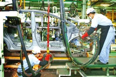 Nhiều tổ chức quốc tế dự báo kinh tế Việt Nam 2024 có thể đạt mức tăng trưởng cao hơn năm 2023. Ảnh: Lê Tiên