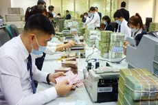 Đẩy mạnh xử lý, thu hồi nợ xấu, nâng cao chất lượng tín dụng