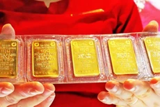 Ngân hàng Nhà nước đề nghị Bộ Công an phối hợp hạn chế tình trạng một số doanh nghiệp lợi dụng giá vàng tăng cao để đầu cơ, trục lợi. Ảnh: Trần Việt