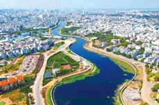 Dự án Xây dựng hạ tầng và cải tạo môi trường kênh Tham Lương - Bến Cát - rạch Nước Lên đã và đang mang lại đời sống mới cho hàng triệu người dân TP.HCM. Ảnh: Anh Tú