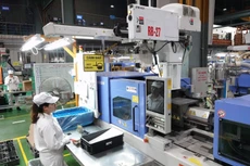 Hoàn thiện chính sách thúc đẩy doanh nghiệp đầu tư sản xuất, kinh doanh gắn với đổi mới sáng tạo, chuyển đổi số, chuyển đổi xanh là một trong những nhóm giải pháp trọng tâm tại Nghị quyết 02/NQ-CP. Ảnh: Tường Lâm