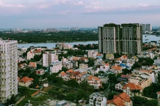 Để đảm bảo thị trường bất động sản trong thời gian tới phát triển ổn định, lành mạnh, Bộ Xây dựng kiến nghị sớm hoàn thiện thế chế, pháp luật liên quan đến lĩnh vực bất động sản. Ảnh: Ngô Bảo Tín