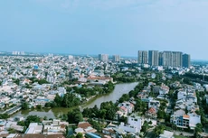 Việc sớm tháo gỡ các vướng mắc, bất cập về thể chế pháp luật cho nhiều dự án bất động sản, nhà ở, sẽ giúp làm tăng nguồn cung và hạ giá thành sản phẩm cho thị trường. Ảnh: Gia An