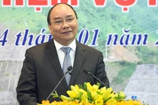 Thủ tướng Nguyễn Xuân Phúc dự Hội nghị tổng kết công tác năm 2016 và triển khai nhiệm vụ năm 2017 của EVN. Ảnh: VGP