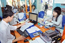 Cải cách mạnh mẽ thủ tục hành chính trong lĩnh vực thuế, hải quan, kho bạc Nhà nước, góp phần tích cực cải thiện môi trường đầu tư, kinh doanh là một trong những sự kiện nổi bật của ngành tài chính năm 2015.