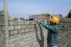 Sử dụng vật liêu xây dựng thân thiện môi trường là xu thế của tương lai. Ảnh: Tất Tiên