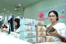 Tính đến tháng 9/2024, dư nợ tín dụng xanh đạt 664.000 tỷ đồng, chiếm tỷ trọng khoảng 4,5% tổng dư nợ toàn nền kinh tế. Ảnh: Lê Tiên