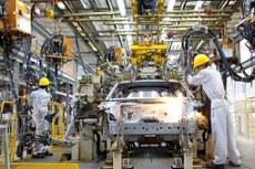 Thúc đẩy và phát huy vai trò của khu vực kinh tế tư nhân là một trong hai động lực tăng trưởng mới của đất nước. Ảnh: Lê Tiên