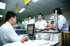 Dự kiến sửa Luật DN lần này sẽ bãi bỏ toàn bộ con dấu, bỏ yêu cầu DN công bố nội dung đăng ký kinh doanh... Ảnh: Lê Tiên