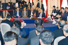 Thủ tướng Nguyễn Xuân Phúc nhấn mạnh, Việt Nam phấn đấu xây dựng môi trường kinh doanh thuận lợi, mang tính cạnh tranh, vươn lên nhóm đầu trong ASEAN và hướng tới tiêu chuẩn cao của Nhóm OECD. Ảnh: Hiếu Nguyễn