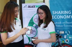 Tại Việt Nam, kinh tế chia sẻ là mô hình kinh doanh mới nhưng đầy tiềm năng. Ảnh: Nhã Chi