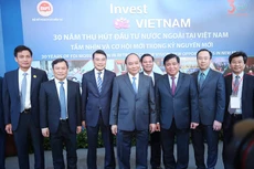 Thủ tướng Nguyễn Xuân Phúc và Bộ trưởng Bộ KH&ĐT Nguyễn Chí Dũng cùng các đại biểu tại hội nghị. Ảnh: Khôi Lâm