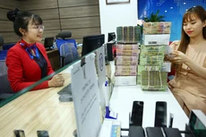NHNN đã chủ trương kiểm soát chặt chẽ điều hành tín dụng. Ảnh: Tiên Toàn