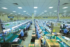 Cần có những ưu đãi về thuế cho doanh nghiệp để kéo khu vực kinh tế tư nhân tham gia sâu hơn vào chuỗi cung ứng, nâng cao tỷ lệ nội địa hóa. Ảnh: Tuấn Anh