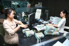 Ngân hàng Nhà nước đặt chỉ tiêu tăng trưởng tín dụng định hướng năm 2025 là 16%. Ảnh: Nhã Chi