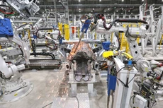 Doanh nghiệp Việt Nam đã thành công trong việc ứng dụng dây chuyền để sản xuất, lắp ráp ô tô của VinFast. Ảnh: An Chi