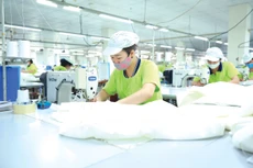 Việc Hoa Kỳ áp thuế đối ứng 46% với hàng hóa Việt Nam sẽ tác động tiêu cực đến các ngành xuất khẩu chủ lực như điện tử, dệt may, da giày, đồ gỗ… Ảnh: Lê Tiên