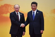 Tổng thống Nga Vladimir Putin gặp Chủ tịch Trung Quốc Tập Cận Bình tại Bắc Kinh hồi năm 2014. Ảnh: AFP