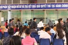 Trong khi số lượng doanh nghiệp đăng ký thành lập mới và bổ sung đăng ký kinh doanh tại Hà Nội đang tăng lên thì công tác đăng ký vẫn còn gặp nhiều khó khăn. Ảnh: Tiên Giang