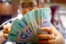 Ngân hàng Nhà nước mạnh tay bãi bỏ giấy phép con