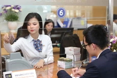 Mục tiêu tăng trưởng tín dụng toàn ngành đặt ra năm 2016 là 18 - 20%