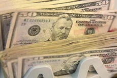 Nguyên nhân khiến USD tăng giá là những bình luận cứng rắn của quan chức FED mấy ngày gần đây khiến giới giao dịch phải đánh giá lại kỳ vọng lãi suất - Ảnh: CNBC/Getty/Bloomberg.