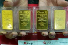 Giá vàng SJC vọt lên gần 34,58 triệu đồng. Ảnh: Q.Đ.