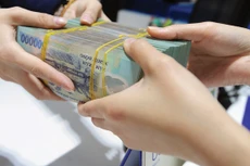 Áp lực giảm giá tiền đồng khả năng sẽ còn tiếp diễn do vẫn đang chịu tác động mạnh từ cả yếu chủ quan và khách quan