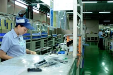 Rất nhiều doanh nghiệp đang phải vay với lãi suất cao hơn lãi suất mà ngân hàng công bố. Ảnh: Nhã Chi