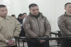 Các bị cáo trước vành móng ngựa.