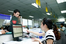 Dự thảo mới nhất Luật sửa đổi, bổ sung một số điều của các luật liên quan đến đầu tư, kinh doanh đề xuất giảm 53 ngành, nghề kinh doanh có điều kiện so với Danh mục hiện hành. Ảnh: Tiên Giang