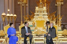 Quốc vương Campuchia Norodom Sihamoni tiếp Chủ tịch nước Trần Đại Quang và Phu nhân. (Ảnh: Nhan Sáng/TTXVN)